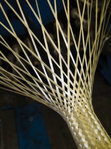 Synthetic over braid for strength